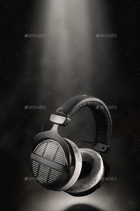 Professional studio headphones on black background. Stock Photo by Ha4ipuri
