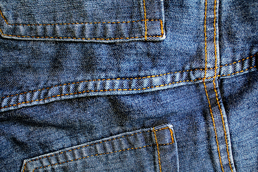 Blue denim background. Texture of jeans fabric. (893930)