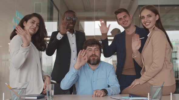 Group of Five Colleagues Having Video Meeting alt
