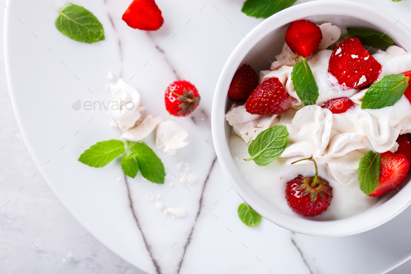 Eton Mess - Strawberries with whipped cream and meringue Classic British summer dessert.