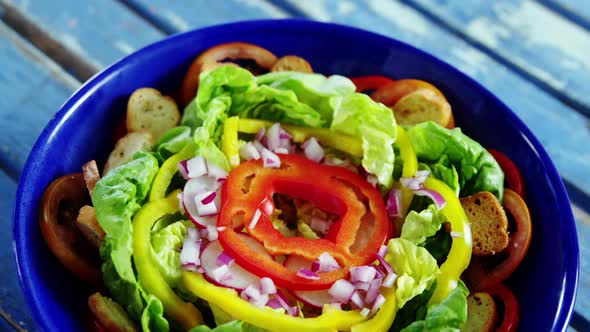 }Salad decorated in bowl alt