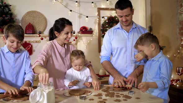 Whole Family Is Making Cookies Together for Christmas and Having Fun.
