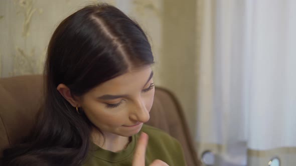 The Artist Paints in Sketchbook Face Portrait Close Up Woman