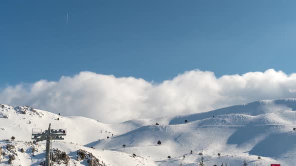 Clouds Over The Snowy Mountains