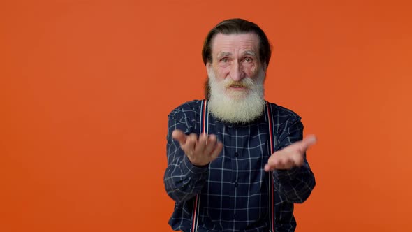 Elderly Man Raising Hands in Indignant Expression Asking Why What Reason of Failure Irritation alt