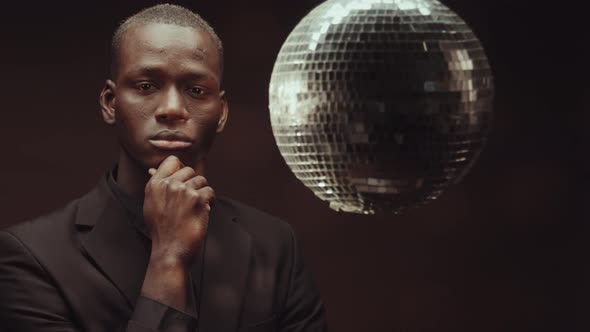 Pensive Man Looking At Camera alt