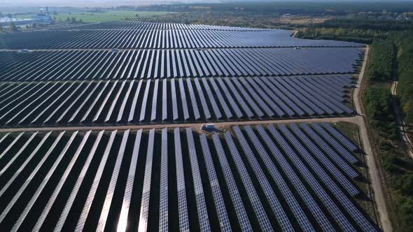 Aerial Drone Footage, Flight Over Solar Panel Farm, Renewable Green Alternative Energy