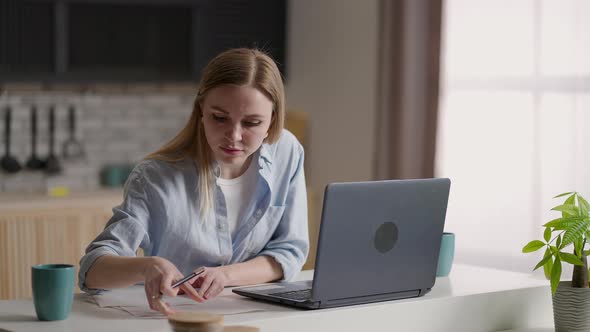 Concentrated Focused Woman Student or Freelancer Working at Laptop in Cafe or Coworking alt