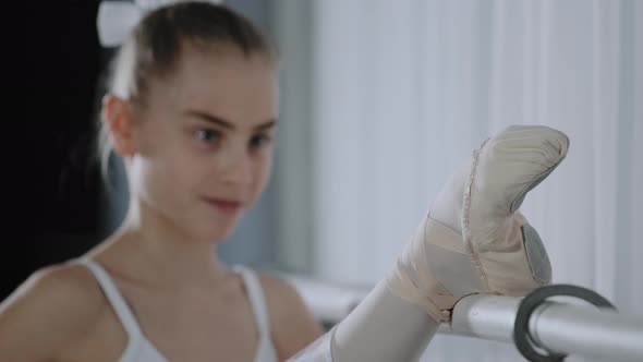 Portrait Motivated Flexible Teenage Girl Dancer Ballerina Caucasian Child Girl Doing Stretch alt