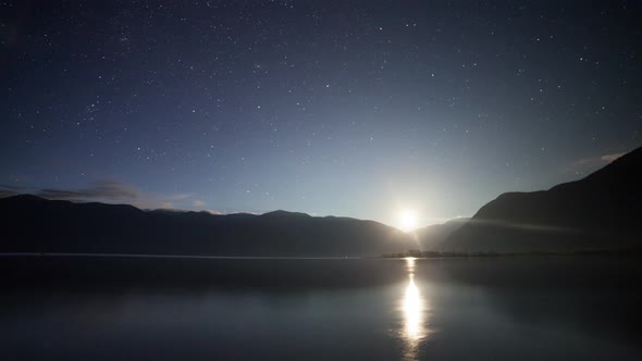 Starry sky and moonrise over Lake Teletskoye alt