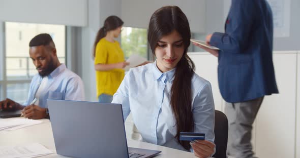Business Woman Buying Online with Credit Card alt