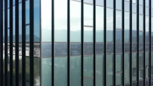 Glass office building - abstract close up of urban modern architecture steel tower alt