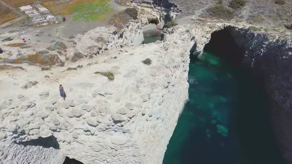 Aerial view of Cliffs and beach in Papafragas beach, Milos, Greece alt