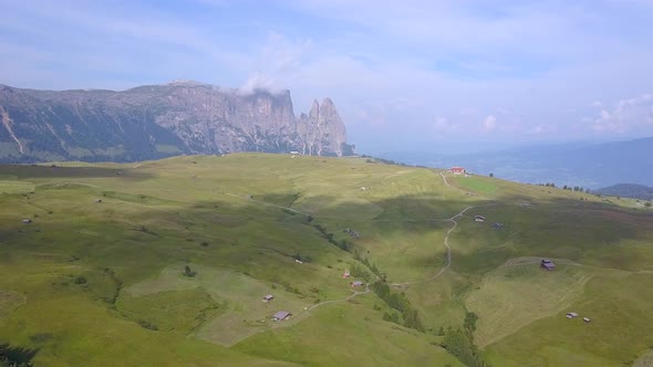 Aerial travel drone view of South Tyrol, Italy and the Dolomites mountains. alt