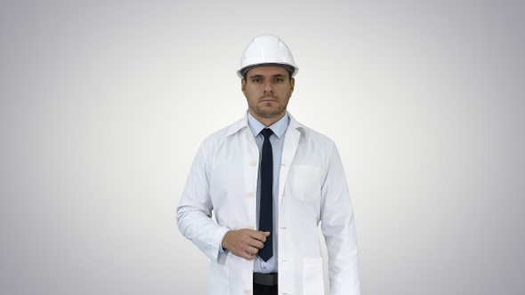 Confident Science Engineer Making Attention Hand Gesture alt