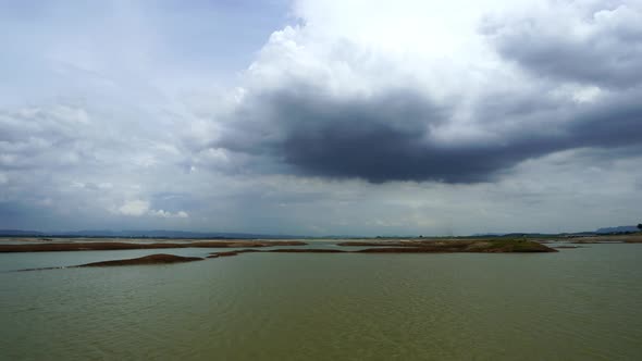 panning shot of less water in Pasak Jolasid Dam at Lopburi, Thailand (drought concept) alt