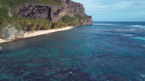 4k 24fps Paradise Beach With Palms And Mountains Inthe Back In The Caribbean 5 alt