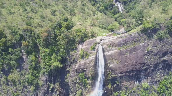 High Diyaluma Falls on Rocky Steep Cliff in Lush Jungles alt
