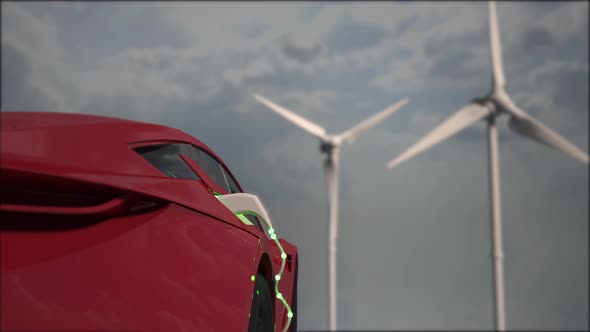 Generic electric red car charging with wind turbines in background.