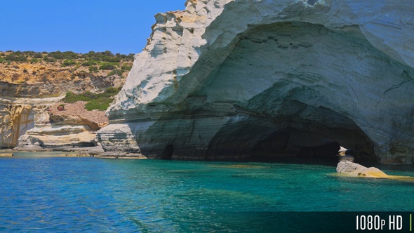 White rock formations and sea caves at Kleftiko shoreline, Milos, Greece alt