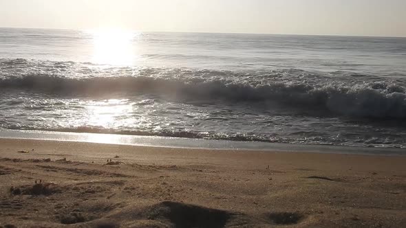 Beautiful Beach sunset, with majestic sky light being reflected. Sunrise beach. sunrise ocean waves.