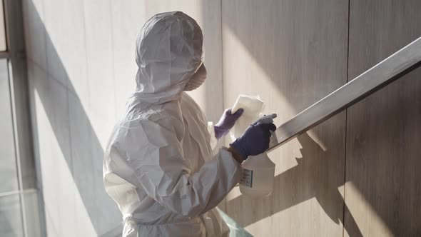 Handheld video showing a  handrail disinfection. Shot with RED helium camera in 8K. alt