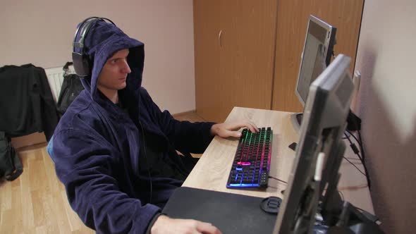 Focused Man Playing Computer Games alt
