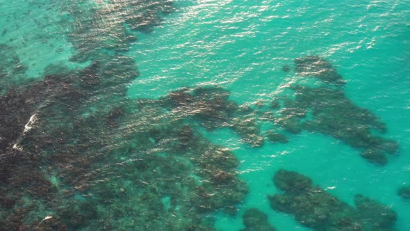 High Aerial View Of Ocean Water With Coral In Jamaica 