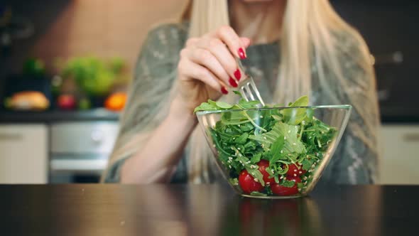 Glad Woman Eating Healthy Salad. alt