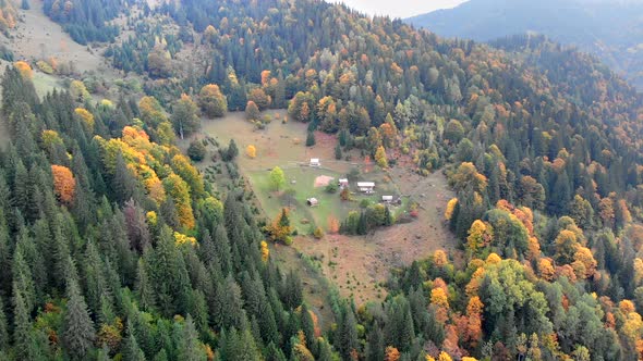 Aerial Shot Of Small Village of Dzembronia on Hill in Carpathians