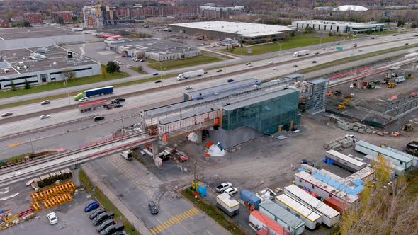 4K aerial view of the construction site of the new Fairview Station of the REM, light rail network.