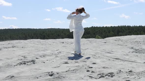 Beautiful Woman Walking on Shore