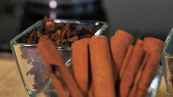 Cinnamon Cloves Nutmeg Star Anise Allspice Cardamom in Glass Bowls alt