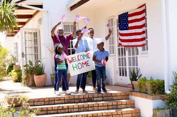 African American three generation family welcoming a soldier coming back home