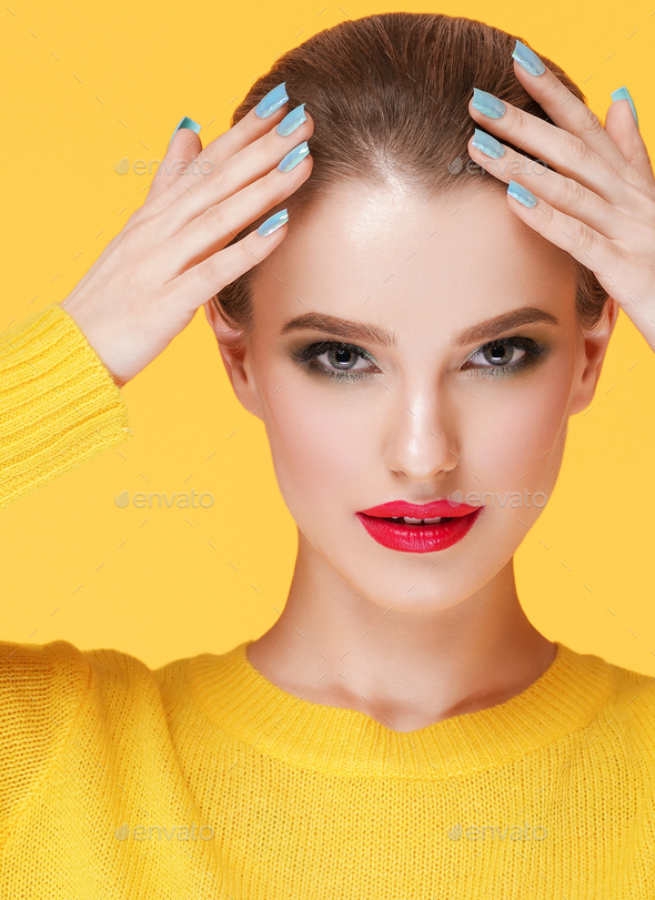 Colorful makeup woman in yellow clothes on color summer background Stock  Photo by kiraliffe