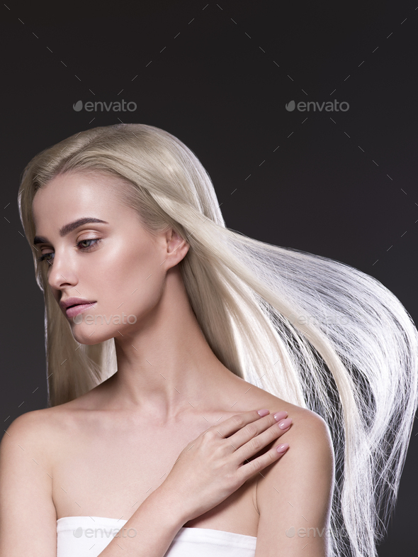 Beautiful long perfect hair blonde woman healthy skin fashion make up natural hairstyle