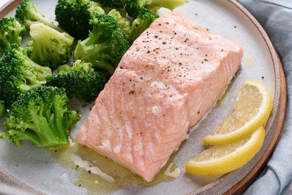 Steam salmon, broccoli, paleo, keto, lshf or dash diet. Mediterranean, Clean eating, balanced food.