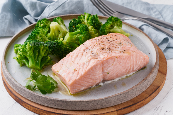 Steam salmon and vegetables, broccoli, paleo, keto, lshf or dash diet. Mediterranean food