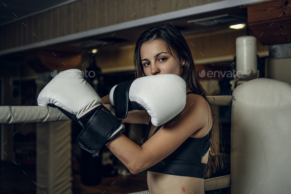 Portrait of brunette female boxer