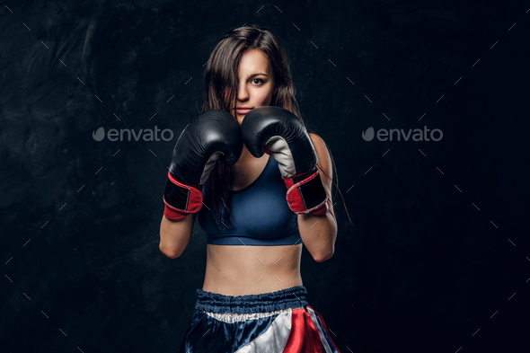 Portrait of pretty professional female boxer