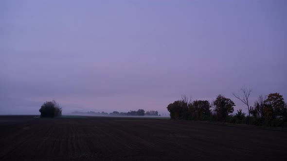 Timelapse Foggy Morning in Rural Landscape