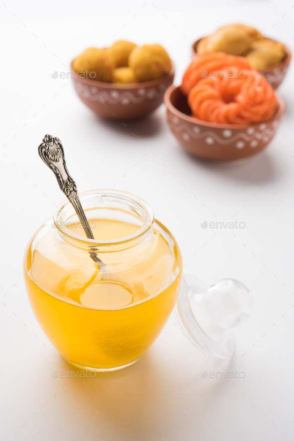 Indian Sweets with Ghee Stock Photo by stockimagefactory PhotoDune