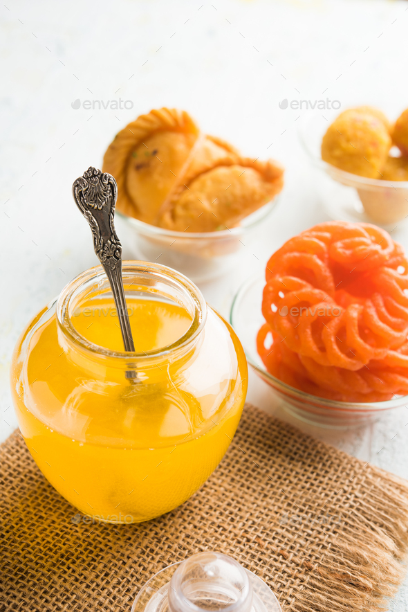 Indian Sweets with Ghee Stock Photo by stockimagefactory PhotoDune