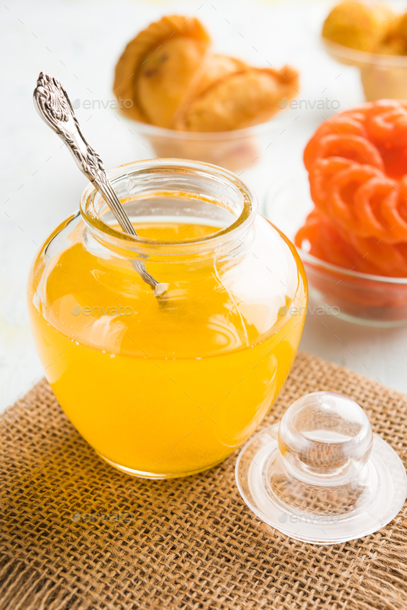 Indian Sweets with Ghee Stock Photo by stockimagefactory PhotoDune