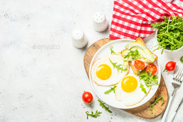 Healthy breakfast with egg, toast and salad - Stock Photo - Images