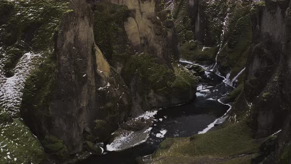 Drone Flight Over Fjaorargljufur Canyon And Snowy Landscape alt