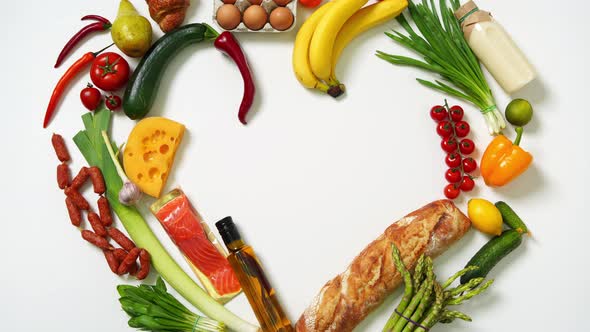 Heart symbol. Heart made from different fruits and vegetables. Top View. Stop Motion