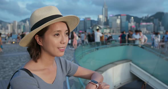 Travel woman visit Hong Kong city alt