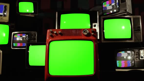 Pile of Retro TV with Test Card pattern and Green Chroma Screen.