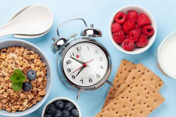 Healthy breakfast with granola, yogurt and berries - Stock Photo - Images